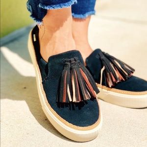 TOMS black suede slip on with tassels